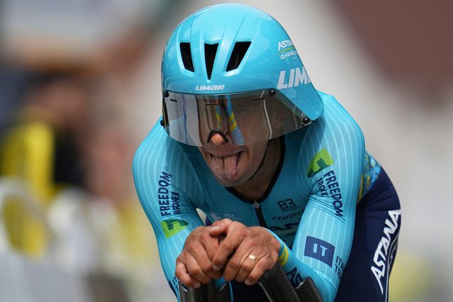 Colombia's Harold Tejada strains during the seventh stage of the Tour de France cycling race, an individual time-trial over 25.3 kilometers (15.7 miles) with start Nuits-Saint-Georges and finish in Gevrey-Chambertin, France, Friday, July 5, 2024. (Photo by Daniel Cole/AP Photo)