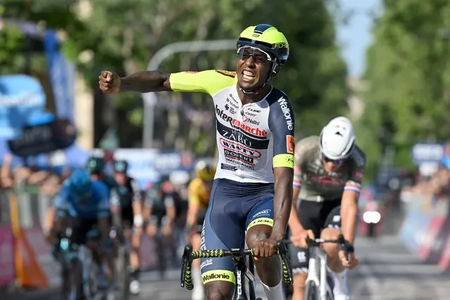 Eritrea's Biniam Girmay celebrates after winning the 10th stage of the Giro D'Italia cycling race from Pescara to Jesi, Italy, Tuesday, May 17, 2022. (Photo by Gian Mattia D'Alberto/LaPresse via AP Photo)