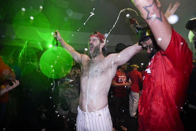 Philadelphia Phillies' Bryce Harper celebrates after the Phillies won a baseball game against the Chicago Cubs to clinch the NL East title, Monday, September 23, 2024, in Philadelphia. (Photo by Matt Slocum/AP Photo)