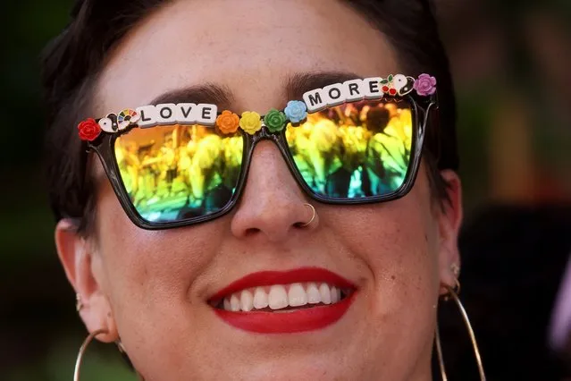 A person smiles during the 2022 NYC Pride parade, in New York City, New York , U.S., June 26, 2022. (Photo by Brendan McDermid/Reuters)