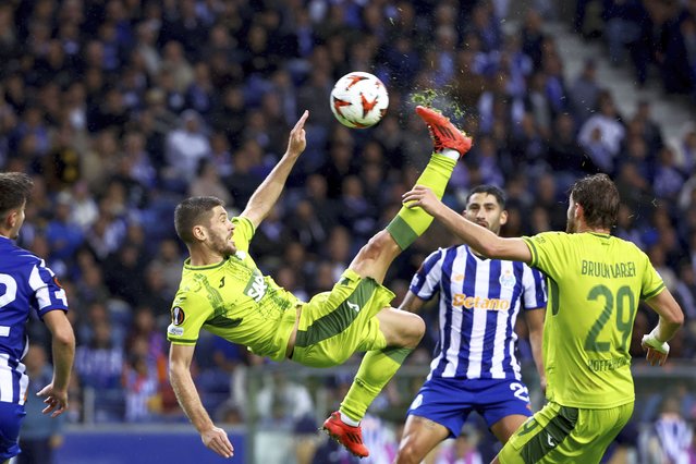 Hoffenheim's Andrej Kramaric attempts an overhead kick at the goal during the Europa League opening phase soccer match between FC Porto and TSG Hoffenheim at the Dragao stadium in Porto, Portugal, Thursday, October 24, 2024. (Photo by Luis Vieira/AP Photo)