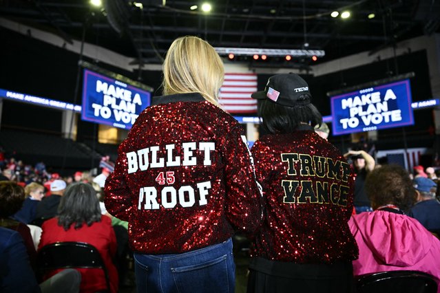 Supporters of former US President and Republican presidential candidate Donald Trump arrive for a campaign rally at the PPL Center in Allentown, Pennsylvania, on October 29, 2024. (Photo by Angela Weiss/AFP Photo)