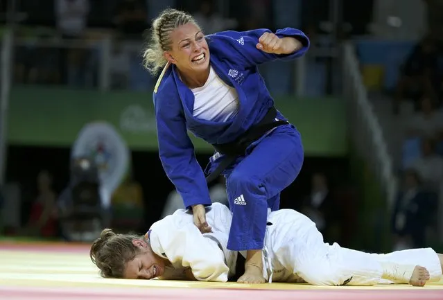 2016 Rio Olympics, Judo, Final, Women, 70 kg Bronze Medal Contests, Carioca Arena 2, Rio de Janeiro, Brazil on August 10, 2016. Sally Conway (GBR) of Britain celebrates winning the bronze medal as Bernadette Graf (AUT) of Austria reacts. (Photo by Toru Hanai/Reuters)