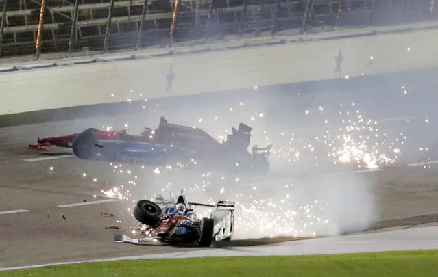 Jack Hawksworth, front, of England and Mikhail Aleshin, rear, of Russia, crash in Turn 4 late in the IndyCar auto race at Texas Motor Speedway, Saturday, August 27, 2016, in Fort Worth, Texas. (Photo by Tony Gutierrez/AP Photo)
