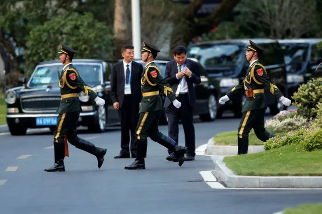 Honour guards move before China's President Xi Jinping and U.S. President Barack Obama hold a bilateral meeting ahead of the G20 Summit, at West Lake State Guest House in Hangzhou, China September 3, 2016. (Photo by Jonathan Ernst/Reuters)