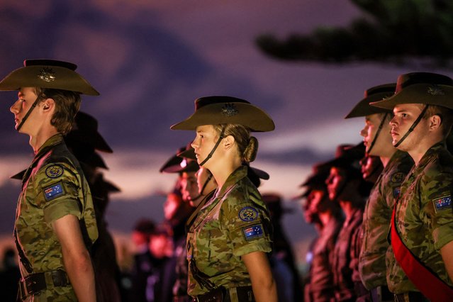 Members of the armed forces stand during the annual ANZAC (Australian and New Zealand Army Corps) Day dawn service at Coogee Beach in Sydney on April 25, 2025. Dawn services were held across the two countries on the anniversary of the ill-fated 1915 campaign of the Australian and New Zealand Army Corps that left 11,500 of them dead in what is now Turkey during World War I. (Photo by David Gray/AFP Photo)