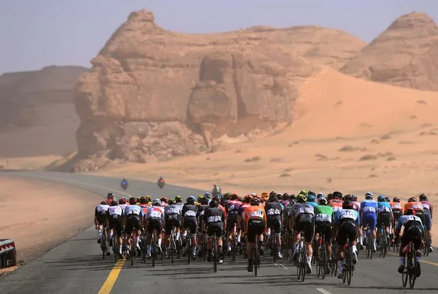 A general view of the peloton competing during the 3rd Saudi Tour 2023, Stage 2 a 184km stage from Winter Park – Al-Ula to Shalal Sijlyat Rocks on January 31, 2023 in Shalal Sijlyat Rocks, Saudi Arabia. (Photo by Alex Broadway/Getty Images)