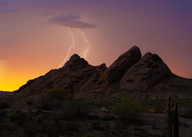 Lightning strikes behind Papago Park in Arizona’s Maricopa County on Thursday, August 8, 2024. (Photo by Michael Chow/The Arizona Republic/USA Today Network)