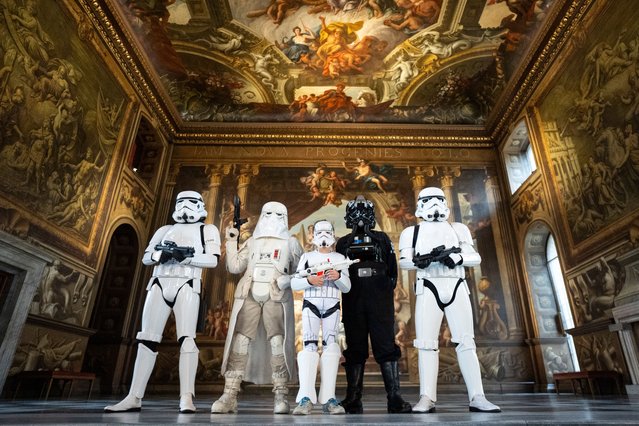 A group of fans dressed as characters from the Star Wars franchise take over the grounds of the Old Royal Naval College at Greenwich's UNESCO Heritage Site to mark a century of filmmaking on-site for the Old Royal Naval College and also a century of filmmaking for Elstree Studios, this partnership pre-curses their Guinness World Records attempt in September – which invites the public to dress up as film and TV characters to celebrate British film on Tuesday, August 19, 2025. (Photo by Ben Whitley/PA Images via Getty Images)