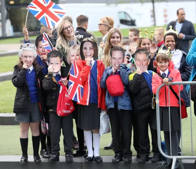Children with royal masks await the arrivial of Prince William, Duke of Cambridge and Catherine, Duchess of Cambridge during their visit to Manchester on October 14, 2016 in Manchester, England. (Photo by Chris Jackson/Getty Images)