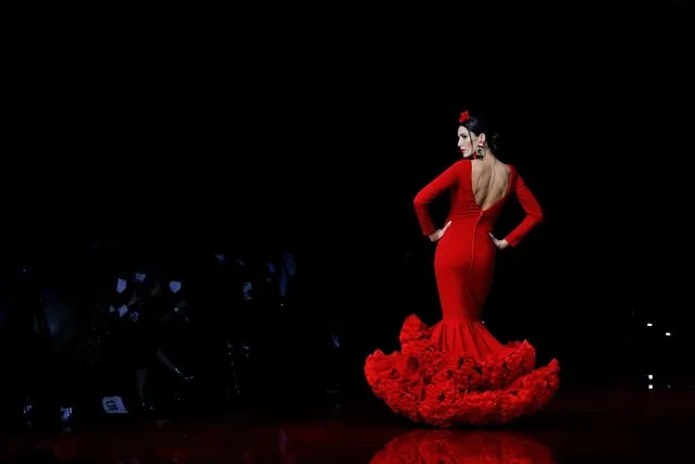 A model presents a creation by Alejandro Santizo during the International Flamenco Fashion Show SIMOF in the Andalusian capital of Seville, Spain, February 3, 2022. (Photo by Marcelo del Pozo/Reuters)