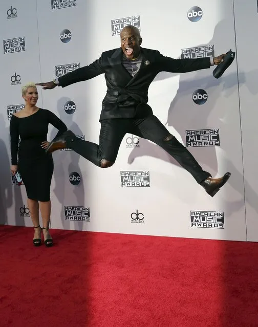 Actor Terry Crews and his wife, Rebecca King-Crews, arrive at the 2015 American Music Awards in Los Angeles, California November 22, 2015. (Photo by David McNew/Reuters)