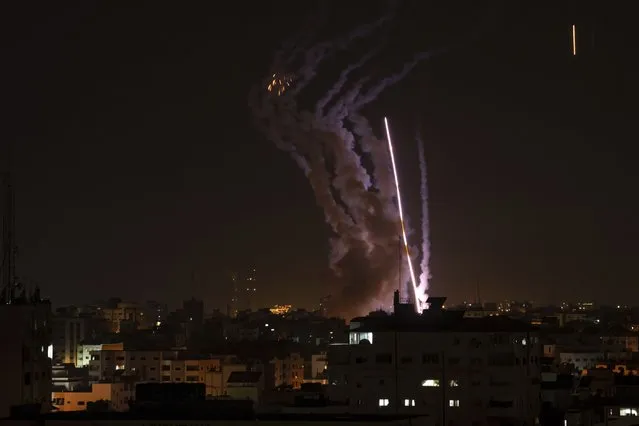Rockets are launched from the Gaza Strip towards Israel, in Gaza, Wednesday, May 10, 2023. (Photo by Fatima Shbair/AP Photo)