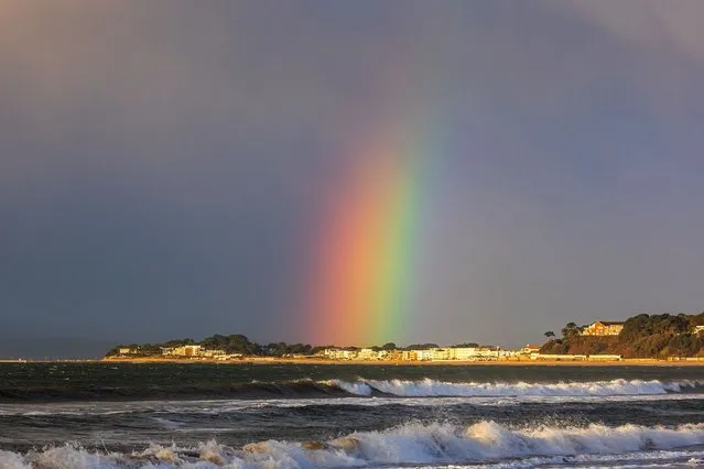 A rainbow at sunrise today over Sandbanks in Dorset on March 14, 2023. Sandbanks is one of the most expensive places to live in the United Kingdom. (Photo by Cenk Albayrak-Touy/Picture Exclusive)