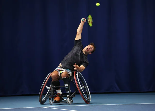 Martin de la Puente of Spain serves against Alfie Hewett and Gordon Reid of Great Britain in the men's doubles final during the Lexus British Open Wheelchair Tennis Championships at Lexus Nottingham Tennis Centre on August 05, 2023 in Nottingham, England. (Photo by Cameron Smith/Getty Images for LTA)