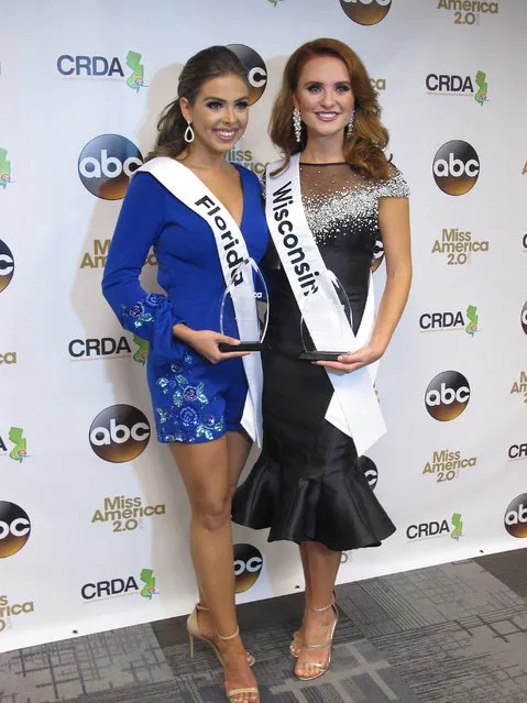 Miss Florida, Taylor Tyson, left, and Miss Wisconsin, Tianna Vanderhei, pose for photos after the first night of preliminary competition at the Miss America competition in Atlantic City, N.J., Wednesday, September 5, 2018. Tyson won the talent competition and Vanderhei won the onstage interview competition. (Photo by Wayne Parry/AP Photo)