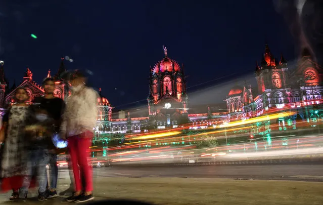 A long exposure photo shows Chhatrapati Shivaji Maharaj Terminus railway station illuminated, ahead of India's Independence Day celebrations in Mumbai, India, 13 August 2021. India will celebrate the 75th anniversary of its independence from British rule on 15 August 2021. (Photo by Divyakant Solanki/EPA/EFE)