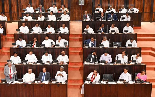 A handout photo made available by the Sri Lankan president's media division shows Sri Lankan President Ranil Wickremesinghe (L) speaking during the 2024 budget presentation at the Parliamentary complex in Colombo, Sri Lanka, 13 November 2023. (Photo by Sri Lankan President Media Division/EPA)