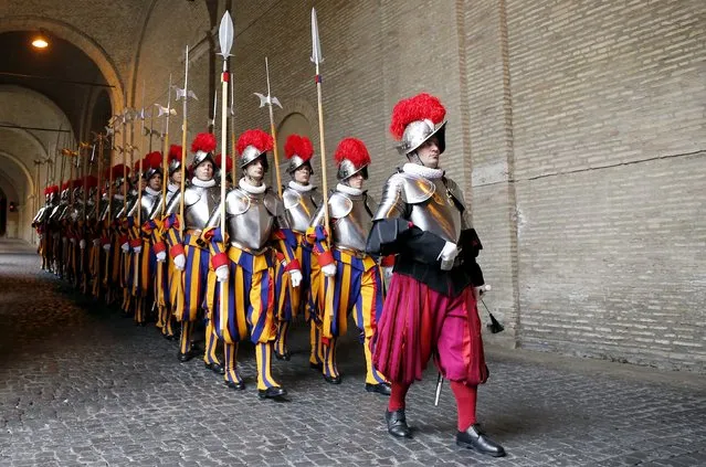 New recruits of the Vatican's elite Swiss Guard march  during the swearing-in ceremony at the Vatican May 6, 2015. (Photo by Giampiero Sposito/Reuters)