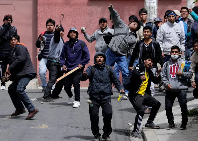 Coca growers from Yungas clash with riot policemen in La Paz, Bolivia February 21, 2017. (Photo by David Mercado/Reuters)