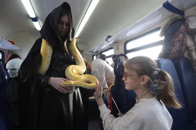 A train jorney for fans of Harry Potter launched in Saint-Petersburg in the real train called Hogwarts express, duration of a trip around 2 hours, actors wearing costumes of heroes of Harry Potter story perform several activities and take photos with fans on January 22, 2022. (Photo by Sergey Mihailicenko/Anadolu Agency via Getty Images)