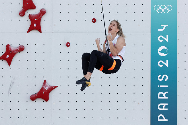 Aleksandra Miroslaw of Team Poland celebrates after her heat and breaking a new world record from her first heat during the Women's Speed Climbing - Seeding Heats on day ten of the Olympic Games Paris 2024 at Le Bourget Sport Climbing Venue on August 05, 2024 in Paris, France. (Photo by Benoit Tessier/Reuters)