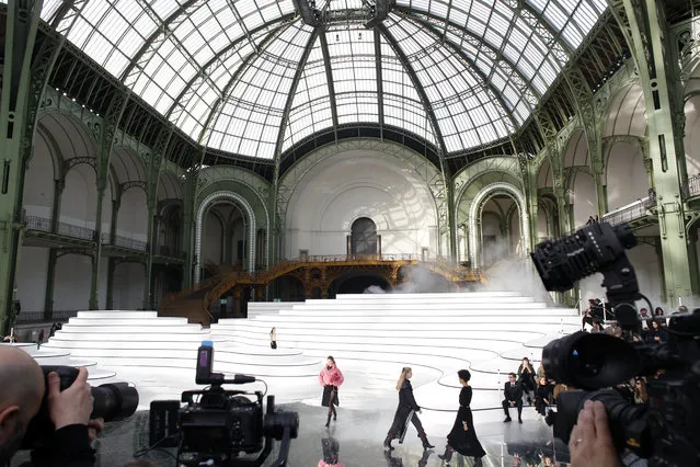 Models wear creations for the Chanel fashion collection during Women's fashion week Fall/Winter 2020/21 presented in Paris, Tuesday, March 3, 2020. (Photo by Thibault Camus/AP Photo)