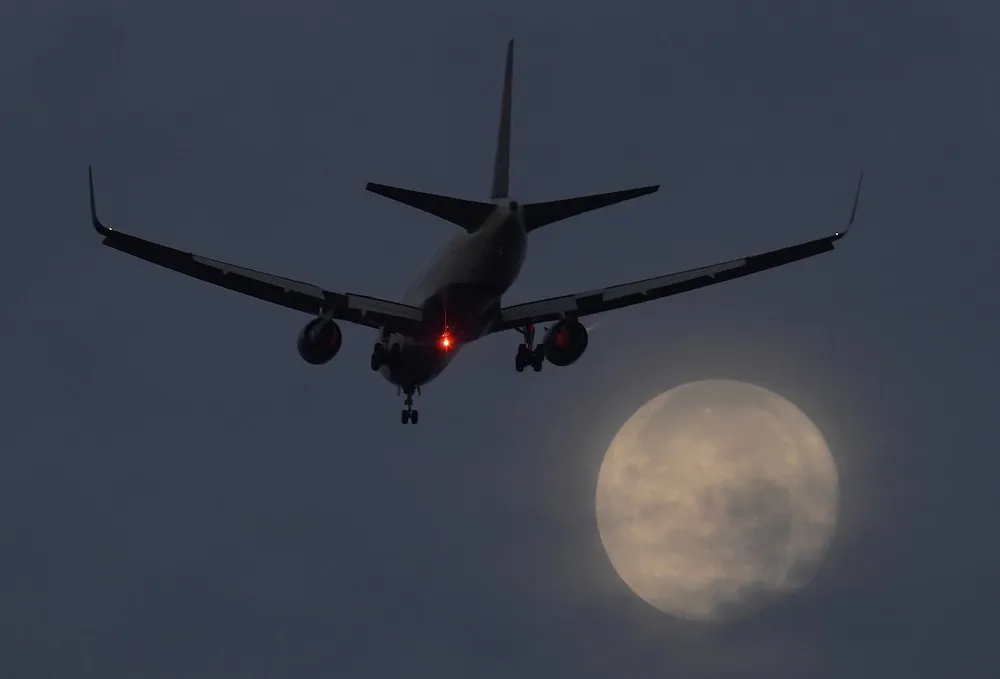 Airplane crossing the Moon