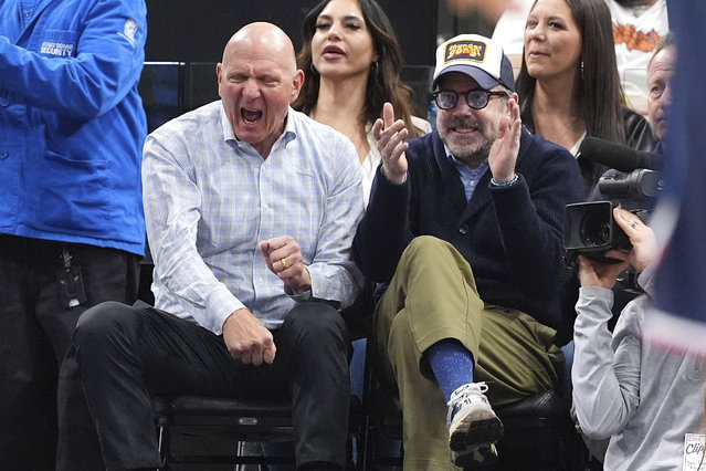 Los Angeles Clippers owner Steve Ballmer, left, and actor Jason Sudeikis celebrate after the Clippers scored during the second half of an NBA basketball game against the Memphis Grizzlies, Wednesday, February 12, 2025, in Inglewood, Calif. (Photo by Mark J. Terrill/AP Photo)