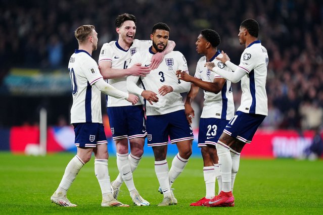 England's Reece James (centre) celebrates scoring their side's first goal of the game with Declan Rice (centre left) and team-mates during the 2026 FIFA World Cup Qualifying, Group K match at Wembley Stadium, London on Monday, March 24, 2025. (Photo by Mike Egerton/PA Wire)