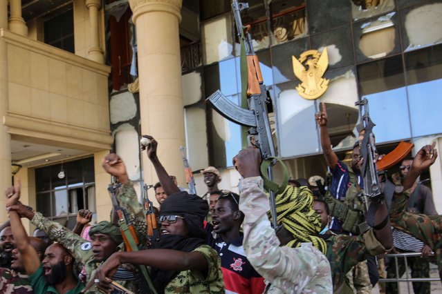 Sudan army soldiers celebrate after they took over the Republican Palace in Khartoum, Sudan, Friday, March 21, 2025. (Photo by AP Photo)