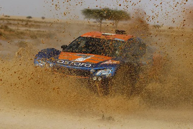 Astara Team's Carlos Checa and co-driver Marc Sola in action during stage 9 of the Dakar Rally Riyadh to Haradh, Saudi Arabia on January 10, 2023. (Photo by Hamad I Mohammed/Reuters)
