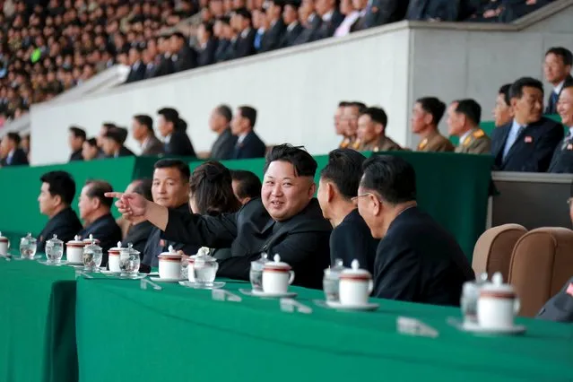North Korean leader Kim Jong Un watches a men's football match between Sonbong and Hwoebul teams for the Mangyongdae Prize Sports Games at Kim Il Sung Stadium on Monday, in this undated photo released by North Korea's Korean Central News Agency (KCNA) in Pyongyang on April 14, 2015. (Photo by Reuters/KCNA)