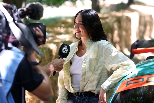 British singer of Kosovar descent Dua Lipa at the Goodwood Festival of Speed, where she went up the world famous hillclimb today in the Dua Lipa Renstall Porsche 911 GT3 RS driven by Iron Dames racing driver Karen Gaillard (not pictured) at Goodwood Festival of Speed presented by Mastercard, which takes place in the parkland surrounding Goodwood House in West Sussex, UK on Saturday 12, 2025. (Photo by Matt Alexander/PA Images via Getty Images)
