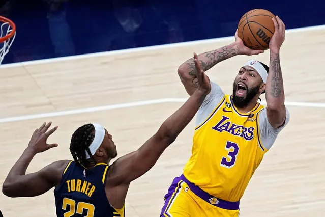 Anthony Davis #3 of the Los Angeles Lakers attempts a shot while being guarded by Myles Turner #33 of the Indiana Pacers in the fourth quarter at Gainbridge Fieldhouse on February 02, 2023 in Indianapolis, Indiana. (Photo by Dylan Buell/Getty Images)