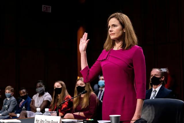U.S. Supreme Court nominee Amy Coney Barrett is sworn in during confirmation hearing before the Senate Judiciary Committee on Capitol Hill in Washington, D.C., U.S., October 12, 2020. (Photo by Erin Schaff/Pool via Reuters)