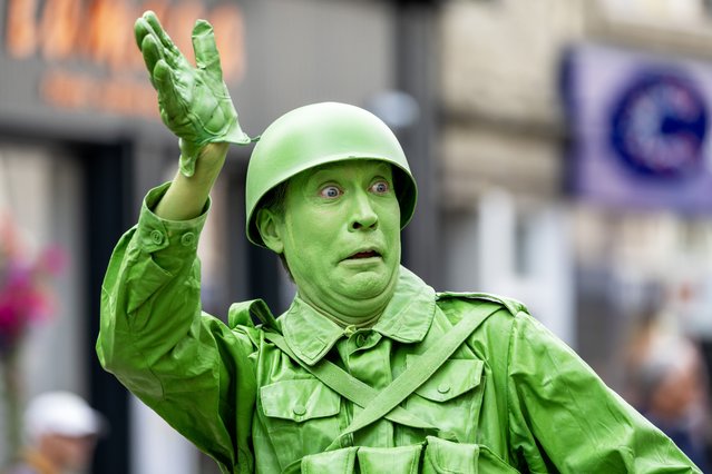 Performers from the Living Statue Company dressed as the Bucket O’ Soldiers from Disney’s Toy Story make their way through the streets as part of the City of Perth Salute parade on August 10, 2025. (Photo by Graeme Hart/Perthshire Picture Agency)