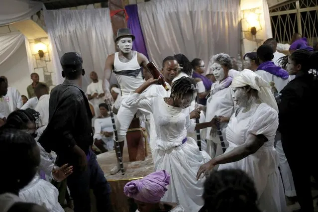 Voodoo believers take part in the celebrations of a two day ceremony of “Fet Gede” at Lakou Savalouwe in Port-au-Prince, Haiti, November 1, 2020. Picture taken November 1, 2020. (Photo by Andres Martinez Casares/Reuters)