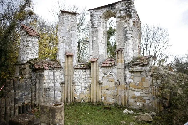 The ruins of the 13th century church of St. Remi at Hurlus, sit atop a small mound, near Reims, France, November 3, 2015. (Photo by Charles Platiau/Reuters)