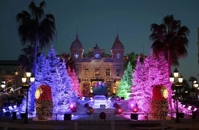Christmas trees frame the Monte Carlo Casino as part of holiday season decorations in Monaco December 10, 2015. (Photo by Eric Gaillard/Reuters)