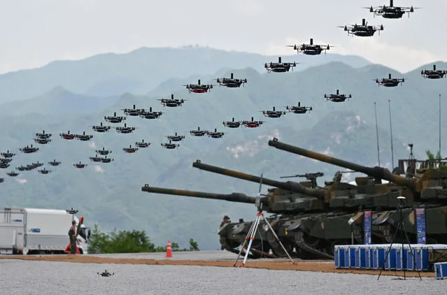South Korea's military drones fly in formation during a South Korea-US joint military drill at Seungjin Fire Training Field in Pocheon on May 25, 2023. (Photo by Yelim Lee/AFP Photo)