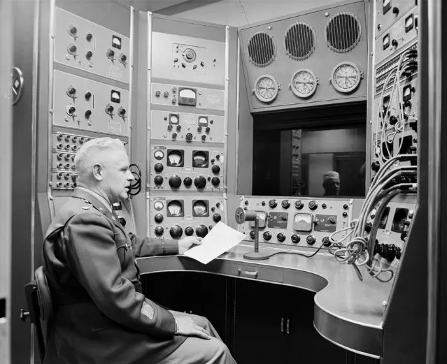 Maj. George McNally, White House signal branch head, sits in front of the multiple control panel in President Truman's new railroad communications car, delivered for service in Washington, February 8, 1952. The panel with its maze of gadgets, controls radio broadcasts, radio photo transmissions, tape recordings of presidential speeches and incoming-outgoing teleprinter copy. Named the General Albert J. Myer, the special car resembles ordinary train cars from the outside. (Photo by Henry Burroughs/AP Photo)