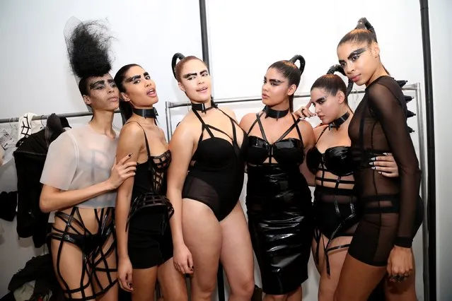 Models pose for a picture backstage at the Chromat AW15: Mindware fashion show during Mercedes-Benz Fashion Week Fall 2015 at Milk Studios on February 13, 2015 in New York City. (Photo by Monica Schipper/Getty Images for Chromat)