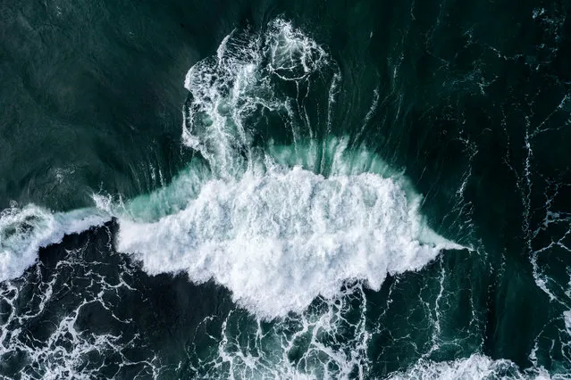 An aerial view as large waves impact the coast at Clovelly Beach on July 16, 2020 in Sydney, Australia. The Bureau of Meteorology has issued a severe weather warning for Sydney and large parts of coastal NSW, with damaging winds and surf expected across the state. (Photo by Brook Mitchell/Getty Images)