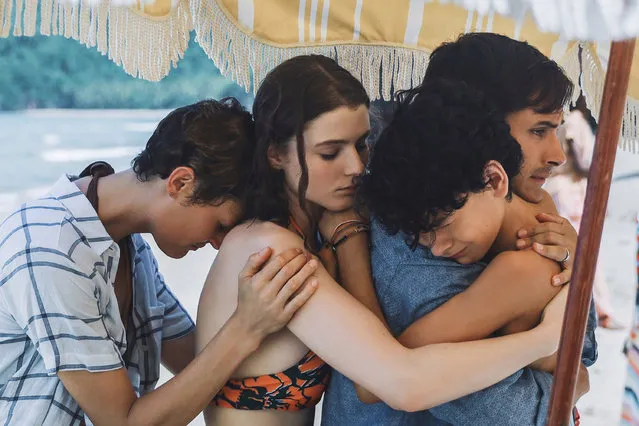 This image released by Universal Pictures shows, from left, Vicky Krieps, Thomasin McKenzie, Gael García Bernal and Luca Faustino Rodriguez in a scene from “Old”. (Photo by Universal Pictures via AP Photo)