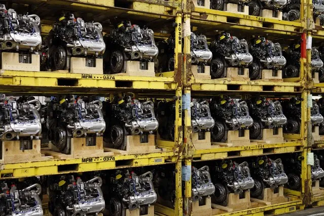 Engines are seen on the automobile assembly line for the Renault Clio IV at the Renault automobile factory in Flins, west of Paris, France, May 5, 2015. (Photo by Benoit Tessier/Reuters)