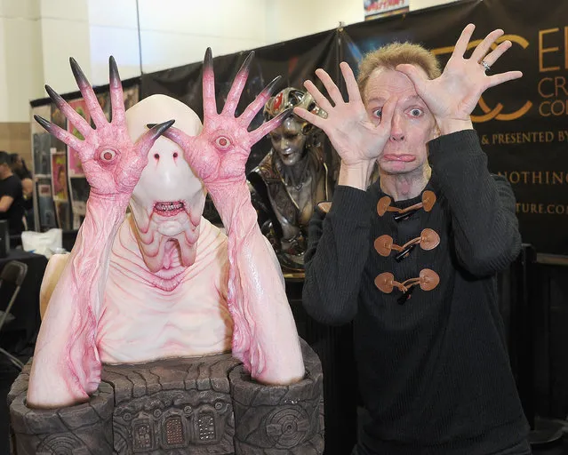 Doug Jones poses with the Pale Man Bust from “Pan's Labrynth” at Elite Creature Collectibles Booth on day 2 of Monsterpalooza held at Pasadena Convention Center on April 13, 2019 in Pasadena, California. (Photo by Albert L. Ortega/Getty Images)