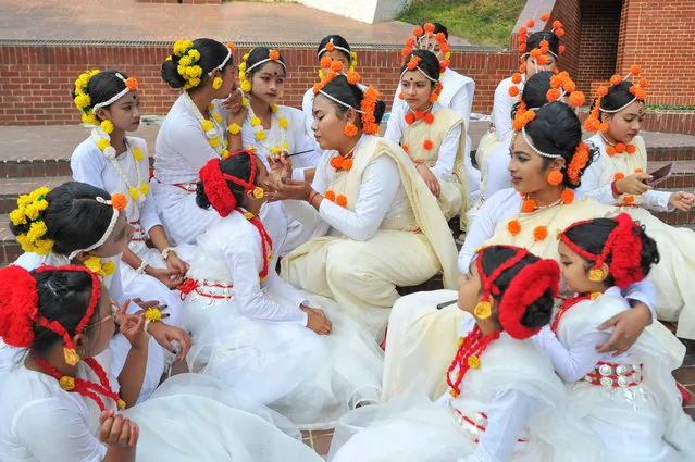 Dancers prepare before a dance performance on the occasion of Language Month at Sylhet Central Shaheed Minar in Sylhet, Bangladesh on February 1, 2023. Language month February was celebrated with an alphabet procession in Sylhet. At 10:30 in the morning, the procession left Sylhet city's Sharda Hall premises and went around the main main road of the city and ended at Sylhet Central Shaheed Minar. Dignitaries including brave freedom fighters, journalists, cultural personalities, poets, literary figures, educationists participated in this procession. Sammilita Natya Parishad Sylhet has been organizing Varnamala procession on the first day of February for the last 10 years. (Photo by Md Rafayat Haque Khan/ZUMA Press Wire/Rex Features/Shutterstock)