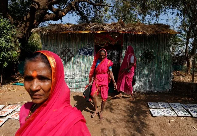 Women leave after attending Aajibaichi Shaala (Grandmothers' School) in Fangane village, India, February 20, 2017. Aajibaichi Shaala is not your ordinary school in India. The students at “grandmothers' school” in the village of Fangane are elderly women who are getting the chance to learn to read. India's literacy rate grew to 74 percent in the decade to 2011, according to the latest census, but female literacy continued to lag the rate for males by a wide margin. About 65 percent of women were found to be literate, compared with 82 percent of men, according to the 2011 report. Education experts and researchers have cited outdated attitudes toward women, including a preference for male children over females, and child marriages as main reasons for the lower female literacy rate. At Aajibaichi, afternoon classes in the one-room school are held six days a week for two hours. The lessons are timed so the women can finish their chores, or their work in the fields, before attending class. (Photo by Danish Siddiqui/Reuters)