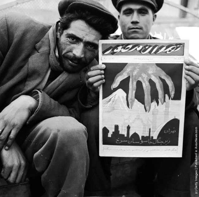 Official Iranian government newspapers lead with a cover denouncing the encroachment of Russia's influence in Iran. In this newspaper a red-starred hand is shown reaching over the northern border mountains of Iran into the mosques of the nation